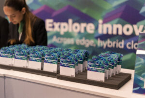 Branded conference materials and event details at a business conference in Barcelona